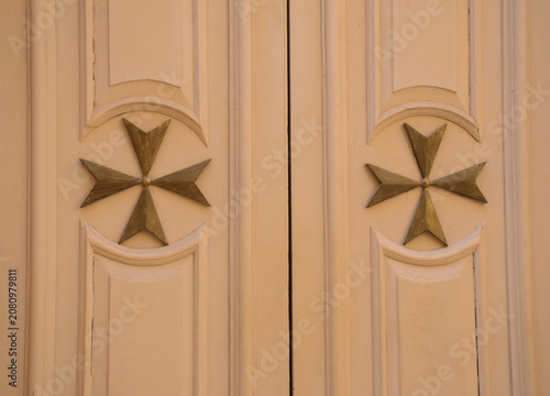 Golden Maltese crosses