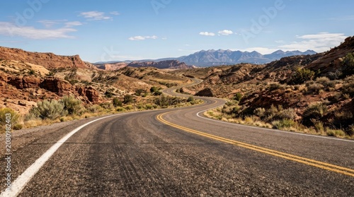 Scenic Desert Mountain Road Curving Through Arid Landscape