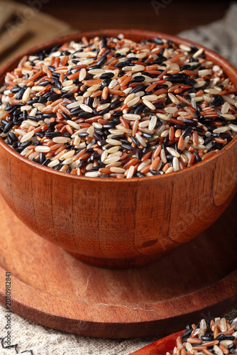 Mixed Rice Grains in Wooden Bowl