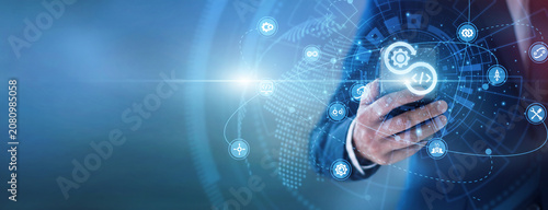 Bilde på lerret Cloud engineer using hand hold mobile managing continuous DevOps workflows