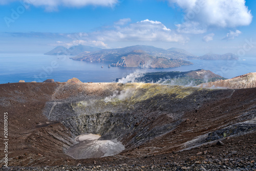 VULCANO, ITALY - JUNE, 2026: View into the steaming active volcanic crater of Gran Cratere with Lipari island in the background