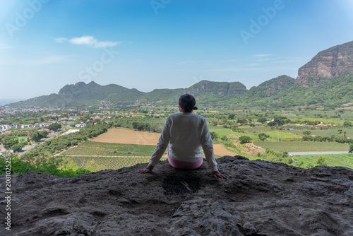 Woman enjoying panoramic valley view at cerro del tonantzin