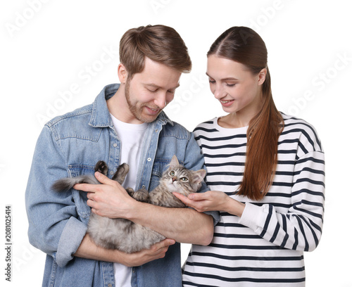 Foto Couple with their cute cat on white background