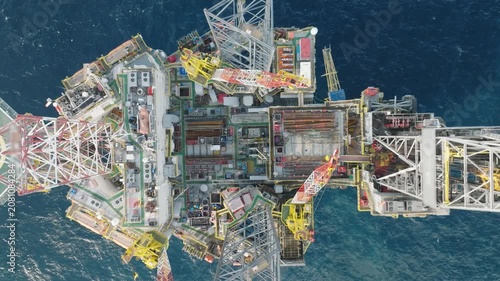 Aerial panoramic view of offshore jack up rig and offshore platform for oil and gas exploration and production. 