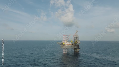 Aerial panoramic view of offshore jack up rig and offshore platform for oil and gas exploration and production. 