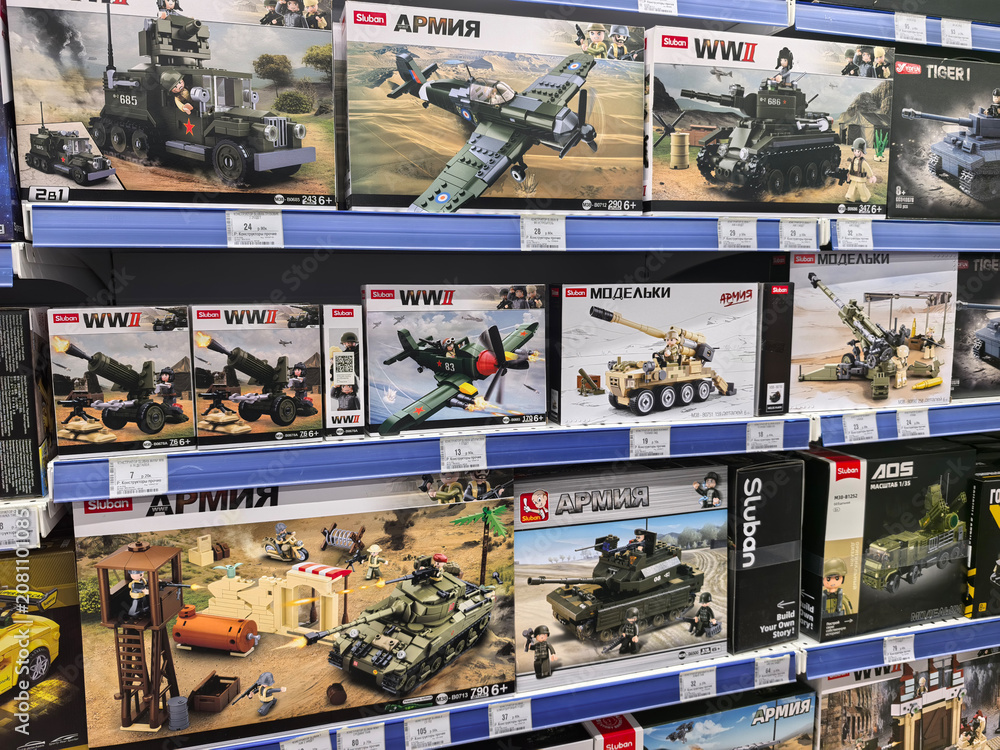 Fototapeta premium Exciting army model kits displayed on colorful shelves in a toy store