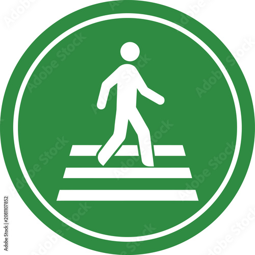 Green circular pedestrian crossing sign with a person walking icon