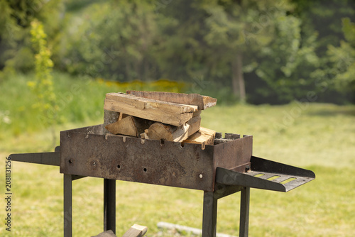 Firewood Inside Rustic Barbecue Grill
