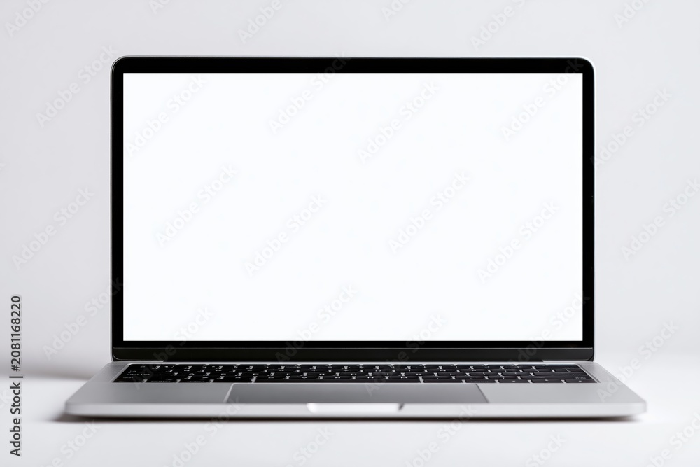 Fototapeta premium Laptop computer mockup with blank white screen on a minimal digital device display