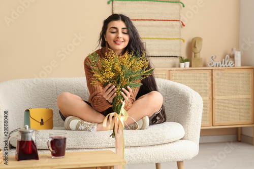 Beautiful young woman with ...