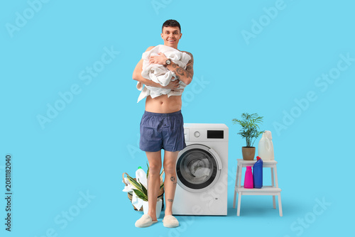 Young man in underpants wit...