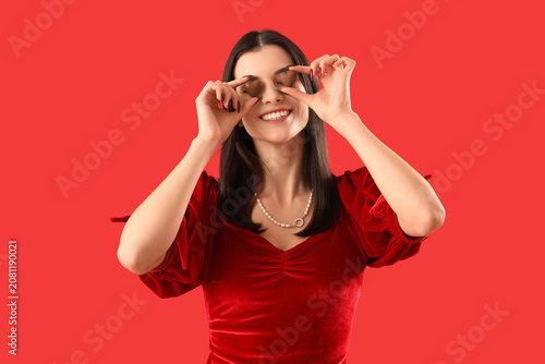 Young woman with heart-shap...