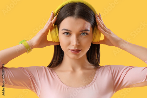 Stylish young woman in head...