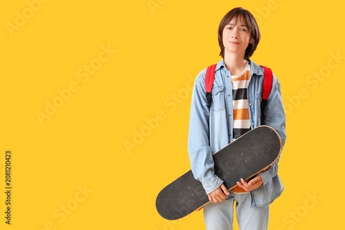 Male student with skateboar...