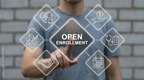 Man pressing open enrollment virtual button for health insurance plan