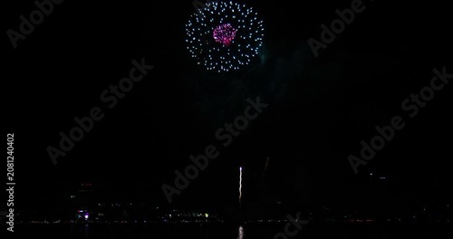 Celebration greeting Beautiful fireworks colorful fireworks on the beach for abstract background , anniversary, celebration , 4th independence day and new year background or wallpaper.