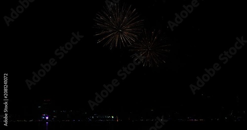 Celebration greeting Beautiful fireworks colorful fireworks on the beach for abstract background , anniversary, celebration , 4th independence day and new year background or wallpaper.