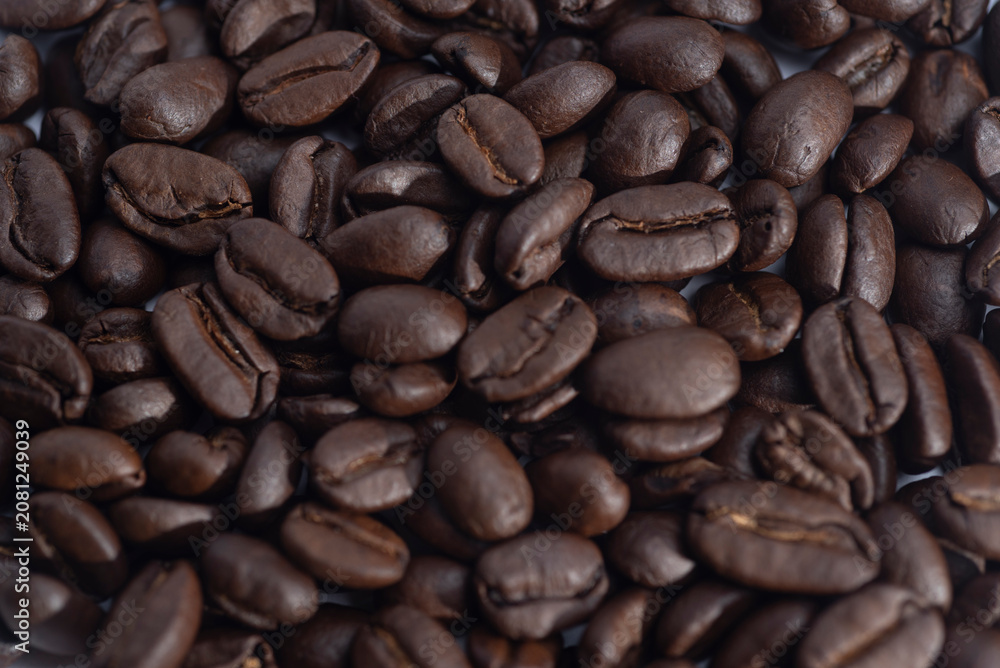 Fototapeta premium Macro background of roasted coffee beans