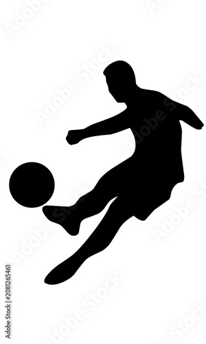 Silhouette of dynamic soccer player kicking ball mid air in action