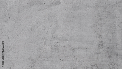 Принти на полотні A close-up view of a grey concrete texture, showing subtle variations in tone an