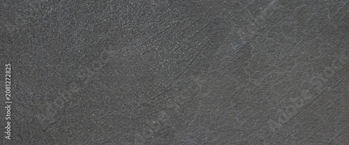 Quadro su tela Dark charcoal slate texture background, natural black stone surface with subtle