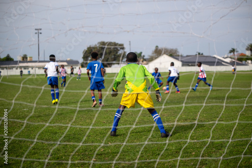 Goalkeeper seen standing in goalpost
