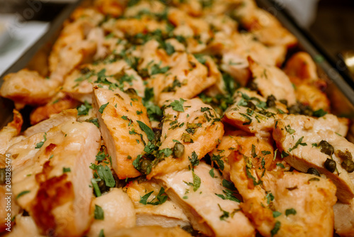 Freshly cooked herb-roasted chicken breast