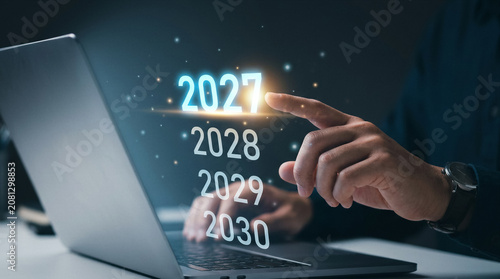 Year 2027 Hologram Timeline Milestone Planning On Touch Laptop Screen