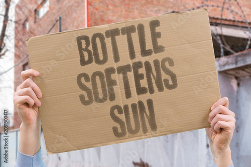 Obraz na plátne "Bottle softens sun" Containers become pliable in solar heat