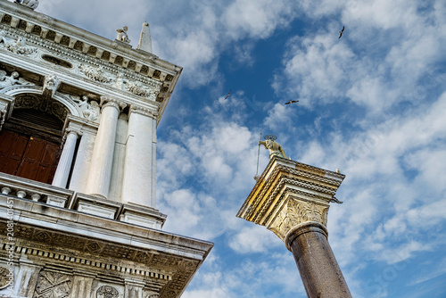 Fotografija Close-up view of a top of a column of St Theodore (patron saint of Venice) and the Library of St