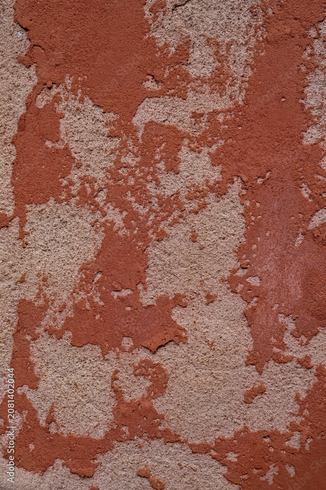 Fototapeta premium Weathered wall surface with gray oncrete and orange paint background texture backdrop.