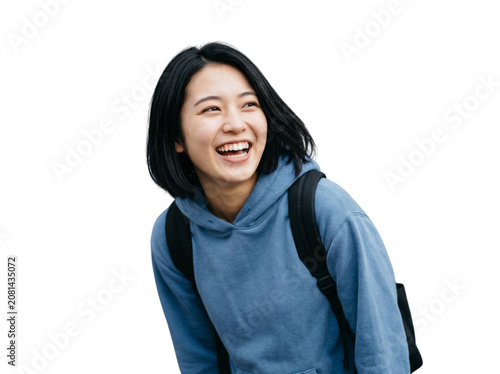 Happy Asian student with backpack laughing merrily