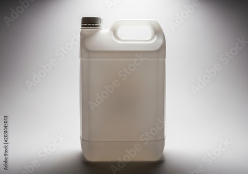 White plastic jerrycan for liquid chemicals isolated on white background