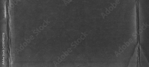 Konstfotografi Dark paper texture in wide panoramic format with embossed edges and copy space