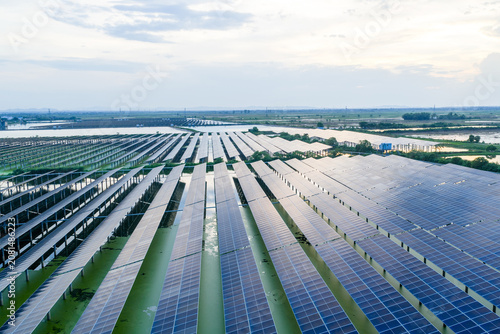 Aerial panoramic view of fishery-solar complementary photovoltaic power station on water