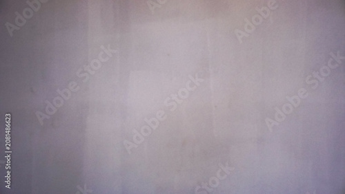 Minimalist photo of wall texture with soft beige and gray tones. Perfect for design, background, and modern decorative themes.