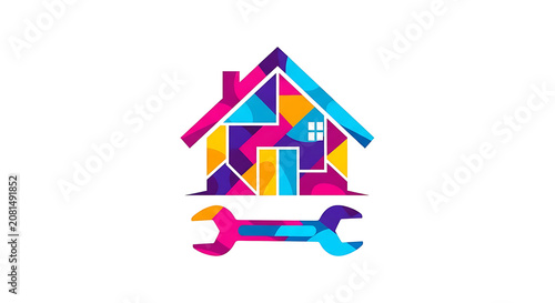Vibrant geometric house with rainbow gradient roof and colorful base home building