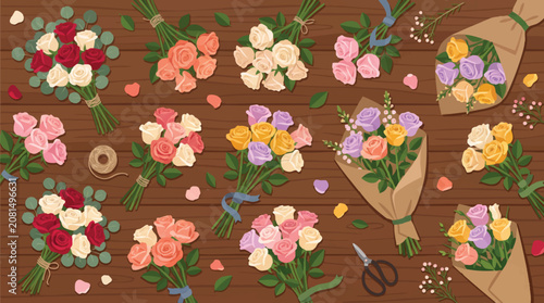 Set of various colorful rose bouquets on dark wooden surface background with blooming