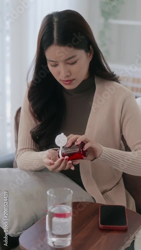 woman take or eat medical pill for treatment healthcare