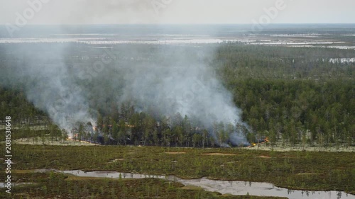 Aerial View of Wildfire Smoke Rising Over Boreal Forest and Wetlands