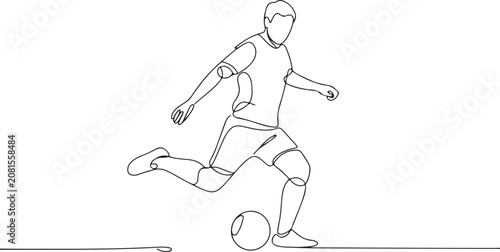 Cuadro en lienzo Soccer player kicking a ball with focus and technique