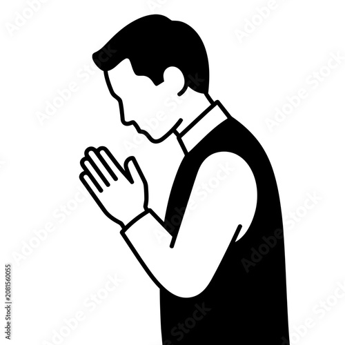 Man praying or bowing with hands together