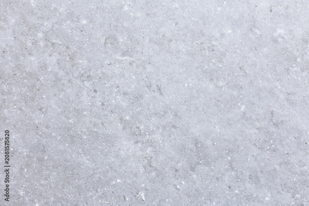 Fototapeta premium The concrete surface texture with subtle speckles and weathered finish