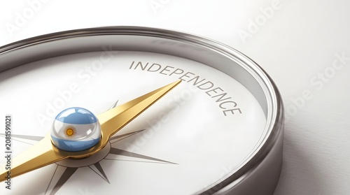 Compass pointing to independence with Argentina flag sphere on needle