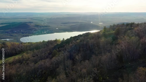 Southern Urals in spring: Irendyk ridge and Talkas Lake at sunset.