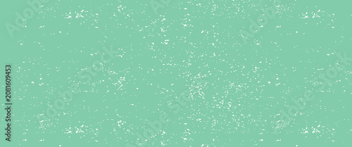 Minimalist falling snow on green background texture.