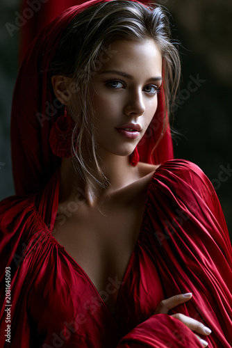 young woman in red with curious look, curious young woman portrait, thoughtful young woman looking with curiosity