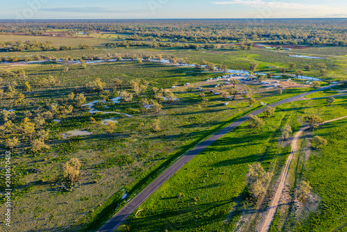 Tableau sur toile Aerial view showcasing the Pilliga Artesian Bore Baths and adjacent campground, surrounded by lush green bushland and peaceful rural scenery near Pilliga, NSW, Australia