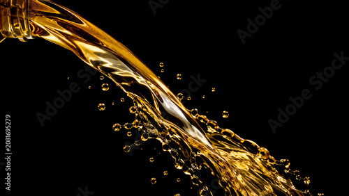 Golden liquid splashing against a dark backdrop, creating a captivating visual of refreshing beverage flowing freely.