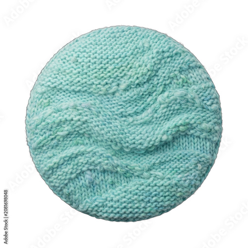 Round light blue knitted fabric texture on black background